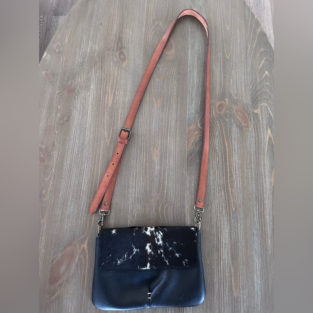 Real leather/cow cowgirl crossbody. Never used.